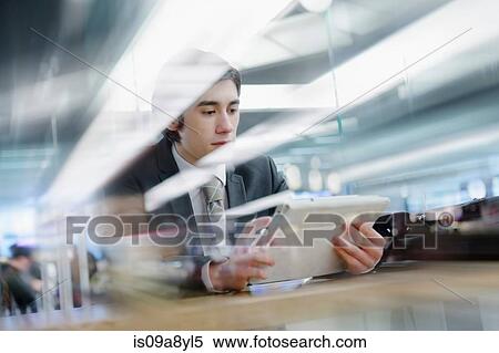 Stock Photography - Business using digital tablet. Fotosearch