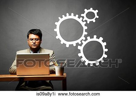 Conceptual image of man as cog in the wheel View Large Photo Image Stock Image - Conceptual image of man as cog in the wheel. Fotosearch