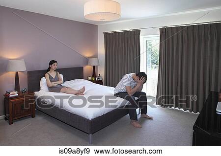 Couple arguing in bedroom View Large Photo Image Stock Photo - Couple arguing in bedroom. Fotosearch