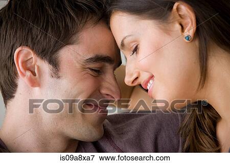 Couple face to face, close up View Large Photo Image Stock Photo - Couple face to face, close up. Fotosearch