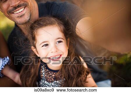 Father and daughter photographing themselves View Large Photo Image Stock Photo - Father and daughter photographing themselves. Fotosearch