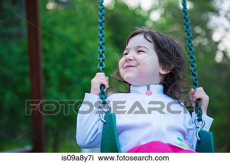 Girl on swing View Large Photo Image Stock Image - Girl on swing. Fotosearch