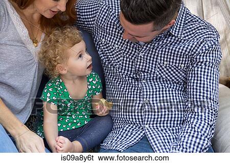 Husband & wife talking to child View Large Photo Image Stock Photograph - Husband & wife talking to child. Fotosearch