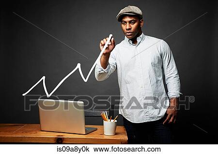 Man drawing line graph View Large Photo Image Stock Image - Man drawing line graph. Fotosearch