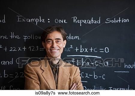 Man in front of blackboard View Large Photo Image Stock Photograph - Man in front of blackboard. Fotosearch