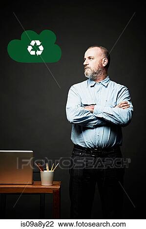 Stock Image - Man looking at environmental issue. Fotosearch