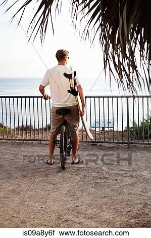 Man looking at ocean View Large Photo Image Stock Image - Man looking at ocean. Fotosearch