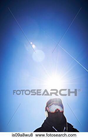 Stock Photo - Man wearing ski mask and jacket. Fotosearch