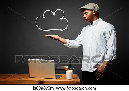 Picture - Man weighing his problem. Fotosearch