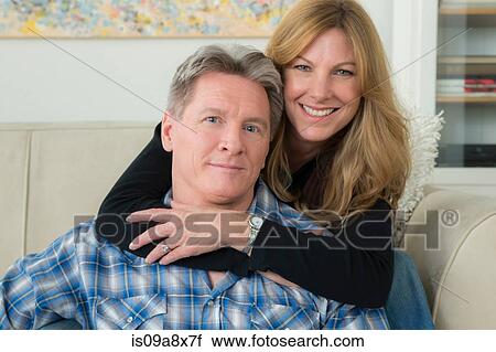 Stock Image - Mature couple hugging. Fotosearch
