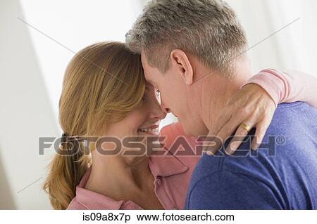 Mature couple hugging View Large Photo Image Stock Photography - Mature couple hugging. Fotosearch