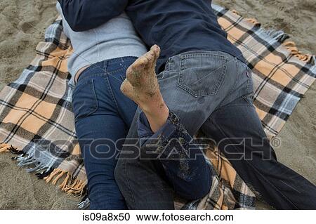 Mature couple lying on picnic blanket, high angle View Large Photo Image Stock Image - Mature couple lying on picnic blanket, high angle. Fotosearch