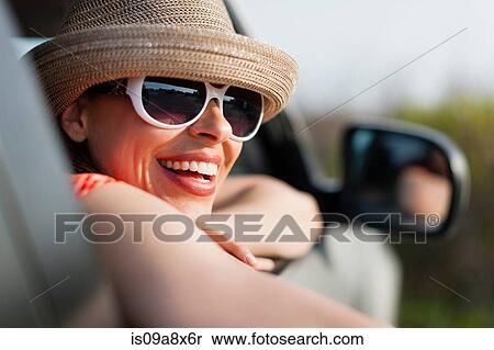 Mature woman wearing sunglasses and sunhat View Large Photo Image Stock Photography - Mature woman wearing sunglasses and sunhat. Fotosearch