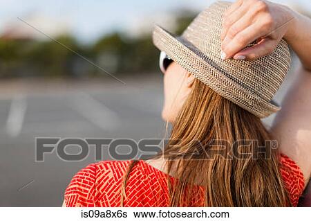 Mature woman wearing sunhat, rear view View Large Photo Image Stock Photograph - Mature woman wearing sunhat, rear view. Fotosearch
