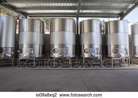 Metal vats in vineyard View Large Photo Image Stock Image - Metal vats in vineyard. Fotosearch