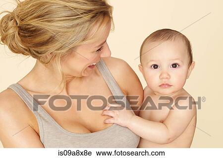 Stock Image - Mother with baby son. Fotosearch