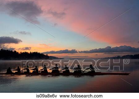 Nine people rowing at sunset View Large Photo Image Stock Photo - Nine people rowing at sunset. Fotosearch