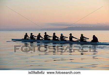 Stock Photo - Nine people rowing. Fotosearch