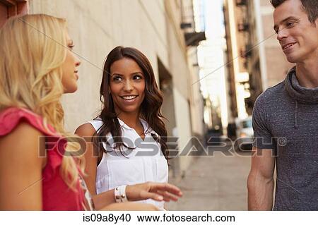 People chatting in back lane View Large Photo Image Stock Image - People chatting in back lane. Fotosearch