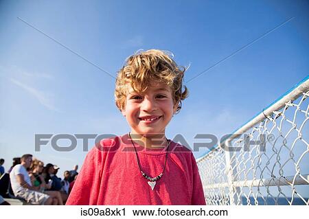Portrait of blonde haired boy smiling View Large Photo Image Stock Image - Portrait of blonde haired boy smiling. Fotosearch