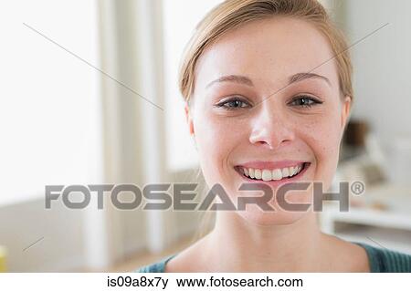 Stock Photo - Portrait of teenage girl smiling. Fotosearch