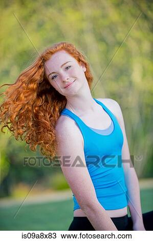 Portrait of teenage girl with long red hair View Large Photo Image Stock Image - Portrait of teenage girl with long red hair. Fotosearch