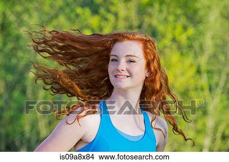 Teen girl with red hair