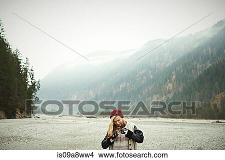 Picture - Portrait of woman in remote setting. Fotosearch