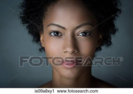 Portrait of woman with afro hair View Large Photo Image Stock Image - Portrait of woman with afro hair. Fotosearch