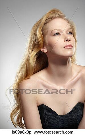 Stock Photography - Portrait of woman with long blonde hair. Fotosearch