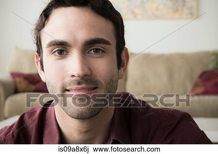 Portrait of young man with black hair View Large Photo Image Stock Image - Portrait of young man with black hair. Fotosearch