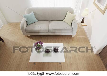 Stock Photo - Simple and minimal furnishing in living room. Fotosearch