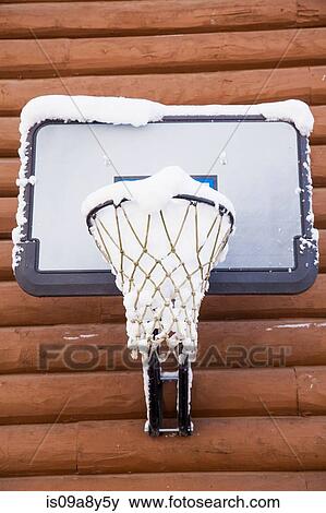 Snow filled basketball net View Large Photo Image Stock Photo - Snow filled basketball net. Fotosearch