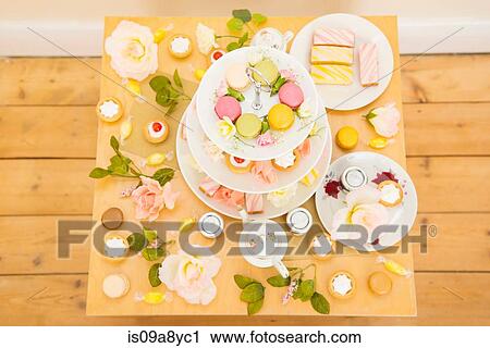 Table with assortment of cakes and confectionery View Large Photo Image Stock Image - Table with assortment of cakes and confectionery. Fotosearch