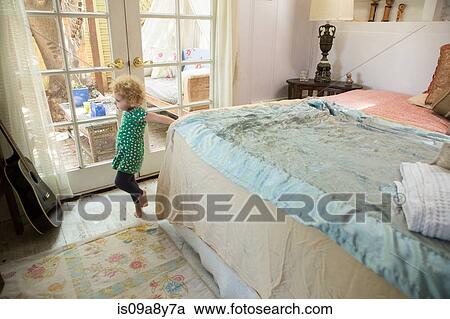 Toddler looking at guitar View Large Photo Image Stock Image - Toddler looking at guitar. Fotosearch