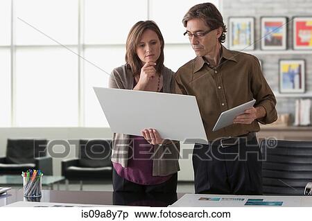 Two people in discussion View Large Photo Image Stock Photography - Two people in discussion. Fotosearch