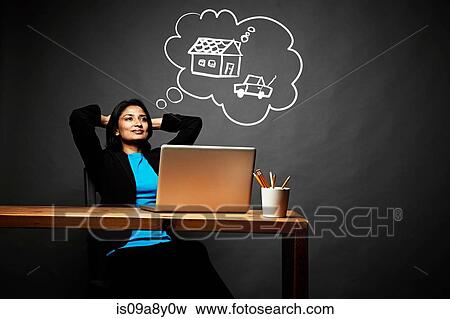 Woman dreaming of new house and car View Large Photo Image Stock Photo - Woman dreaming of new house and car. Fotosearch