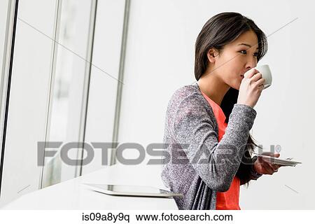 Stock Photography - Woman having a break. Fotosearch