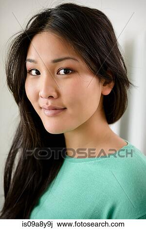 Woman looking sideways at camera View Large Photo Image Stock Image - Woman looking sideways at camera. Fotosearch