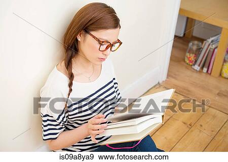 Stock Photo - Woman reading book. Fotosearch