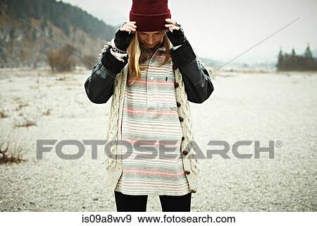 Woman standing in forest View Large Photo Image Stock Photo - Woman standing in forest. Fotosearch