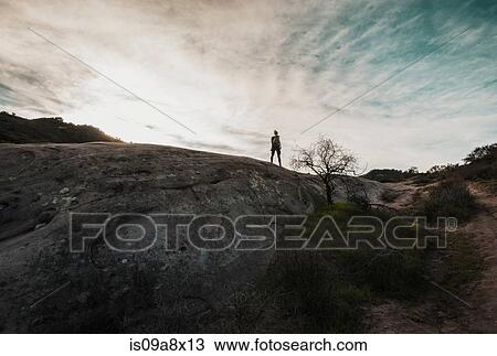 Woman standing on mountain at Topanga, California View Large Photo Image Stock Image - Woman standing on mountain at Topanga, California. Fotosearch