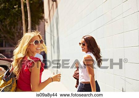 Picture - Women walking away. Fotosearch