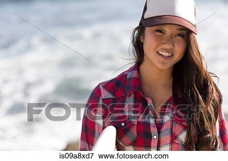 girl wearing baseball cap