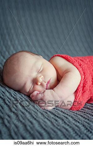 Baby boy lying on grey blanket, sleeping View Large Photo Image Stock Image - Baby boy lying on grey blanket, sleeping. Fotosearch