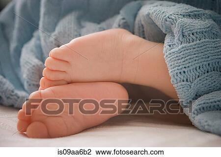 Baby boy 's feet, close up View Large Photo Image Stock Image - Baby boy 's feet, close up. Fotosearch