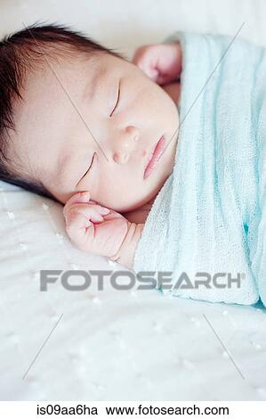 Baby boy wrapped in blanket sleeping View Large Photo Image Stock Image - Baby boy wrapped in blanket sleeping. Fotosearch