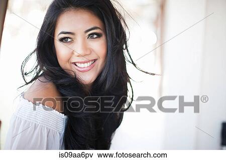 Stock Photo - Close up portrait of young woman. Fotosearch