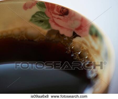 Stock Photo - Cup of fresh coffee, close up. Fotosearch
