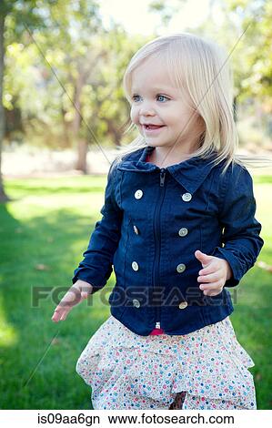 Female toddler in park View Large Photo Image Picture - Female toddler in park. Fotosearch